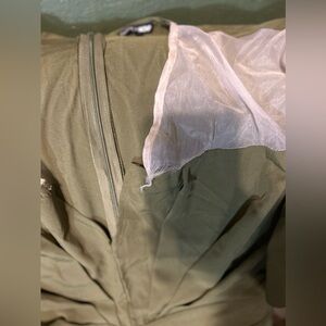 Torn due to wash. Can be fixed